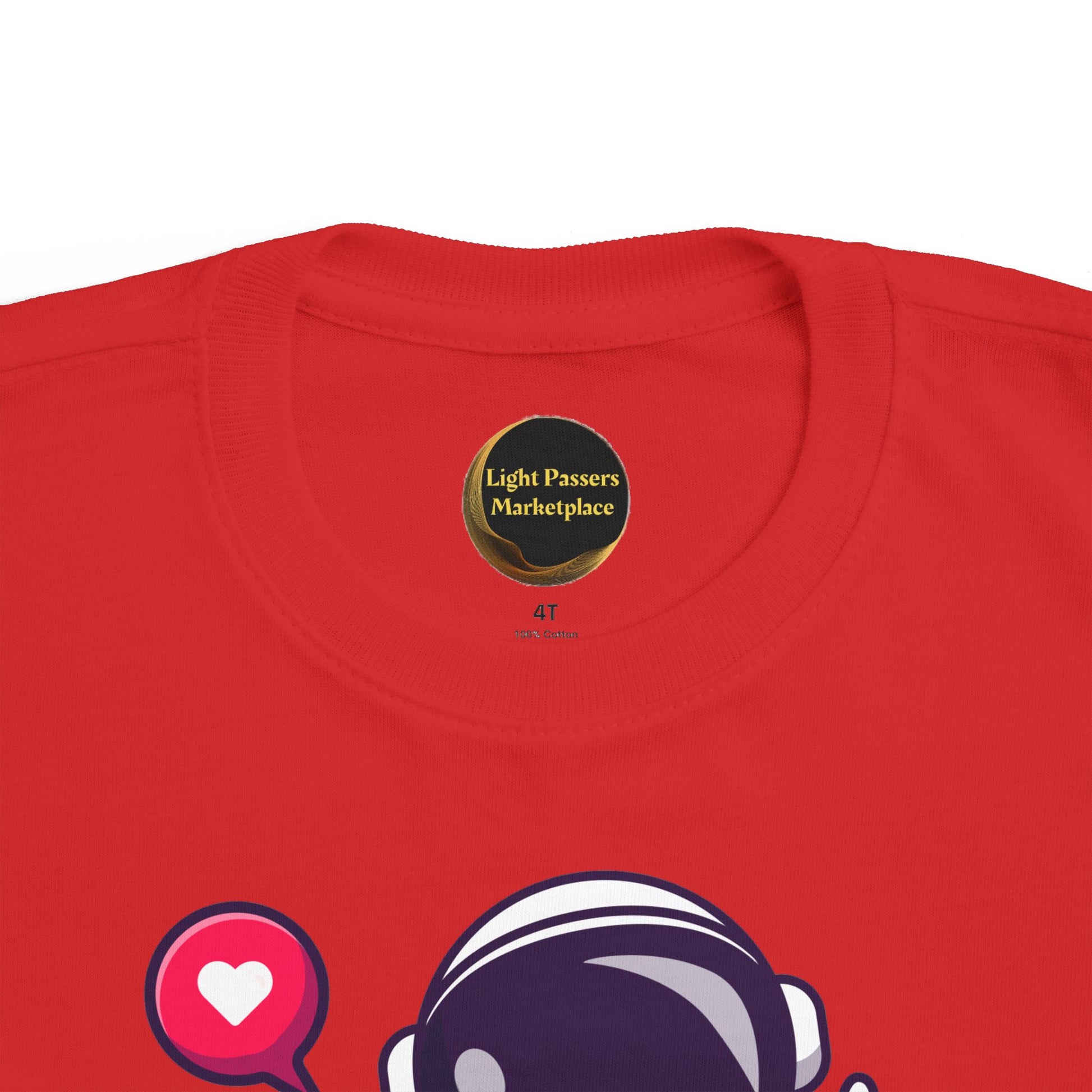 Peace Astronaut Toddler T-shirt: Bright red, 100% cotton with a playful astronaut graphic and heart in a speech bubble, perfect for sensitive skin.
