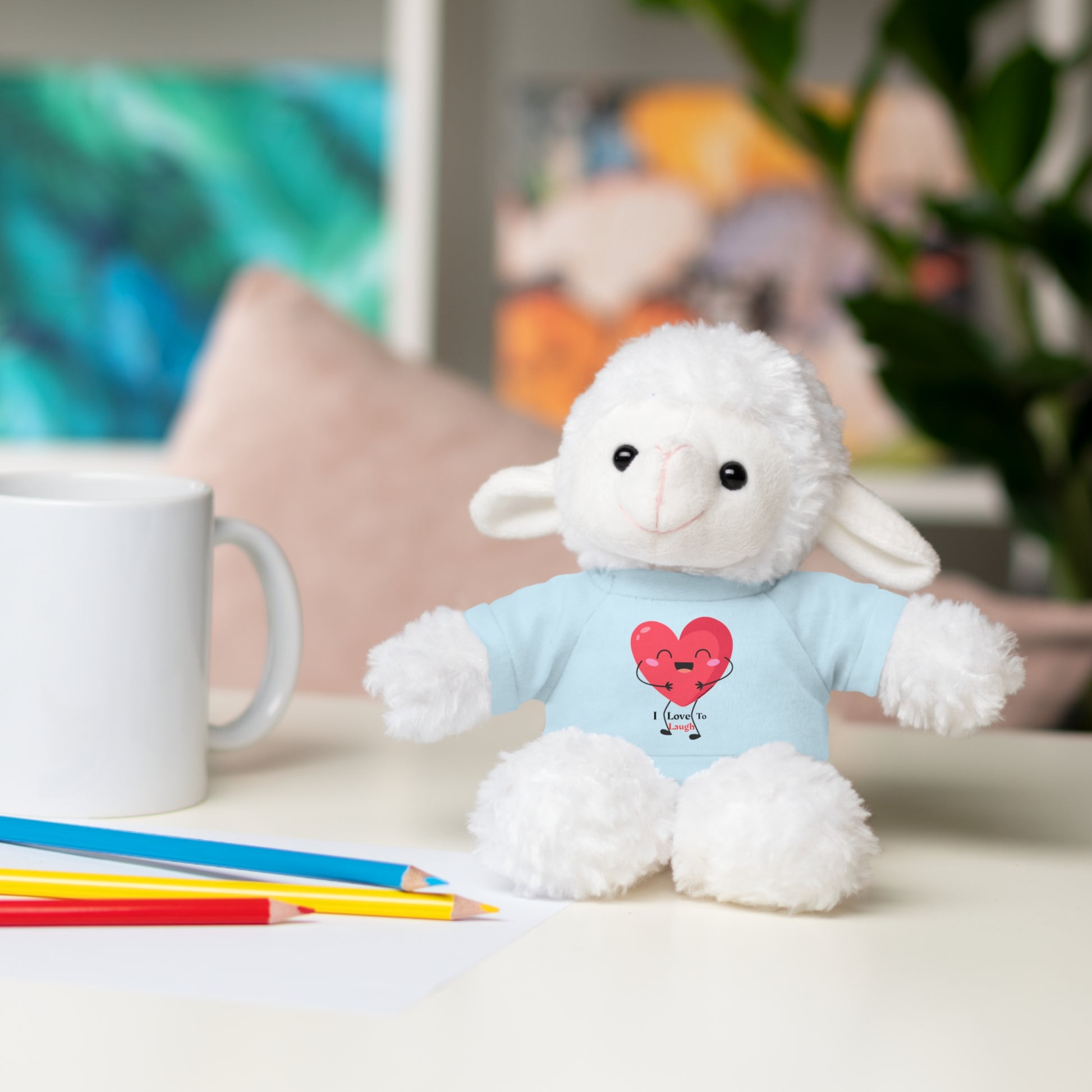 Stuffed animal with I Love to Laugh removable shirt, available in six options: Bear, Sheep, Bunny, Jaguar, Panda, Lion, 8 tall, customizable shirt color.