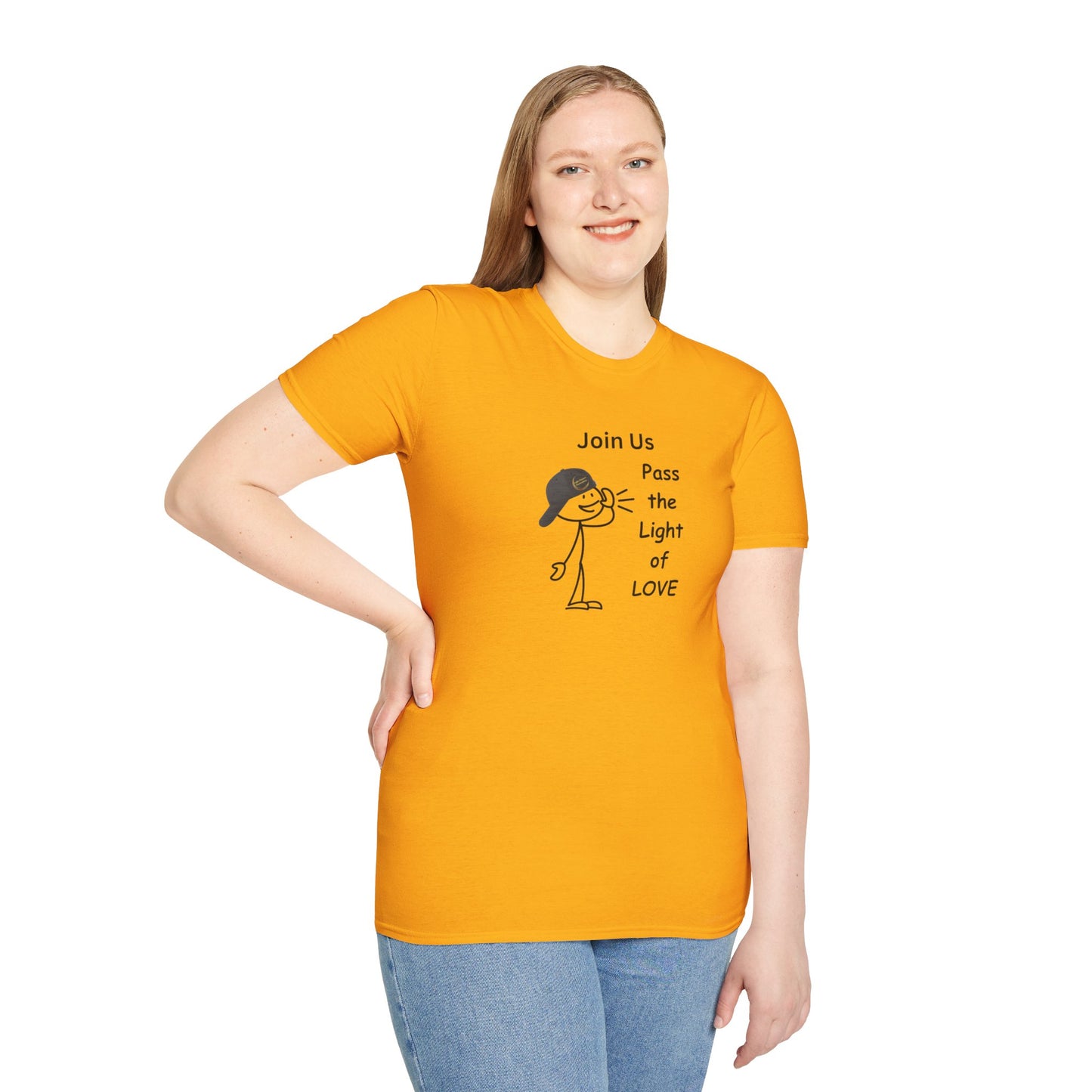 A woman in a yellow shirt smiles, showcasing the Join Us Pass the Light of Love Unisex T-shirt. Close-up of blue jeans and a stick figure with a hat add casual vibes.