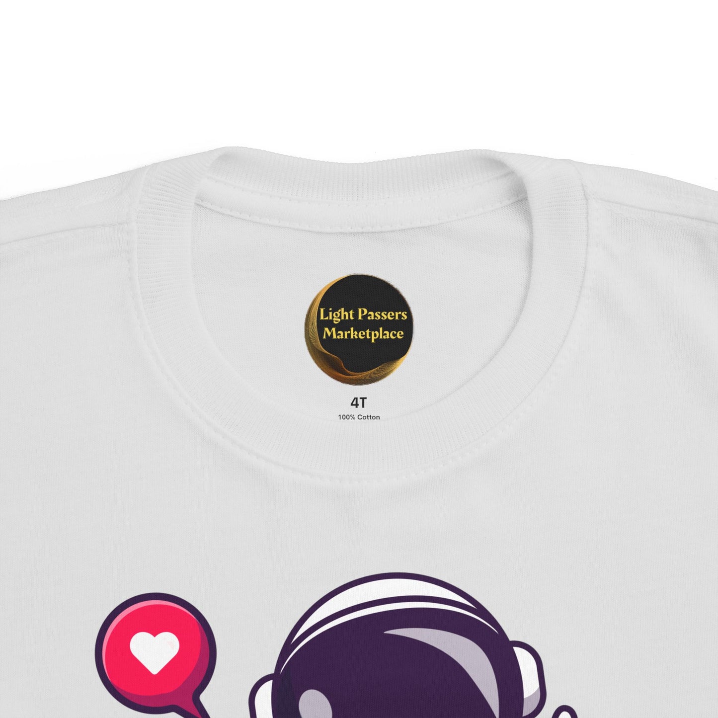 Peace Astronaut Toddler T-shirt with astronaut helmet and heart graphic. Features tear-away label and soft cotton, ideal for toddlers’ sensitive skin.