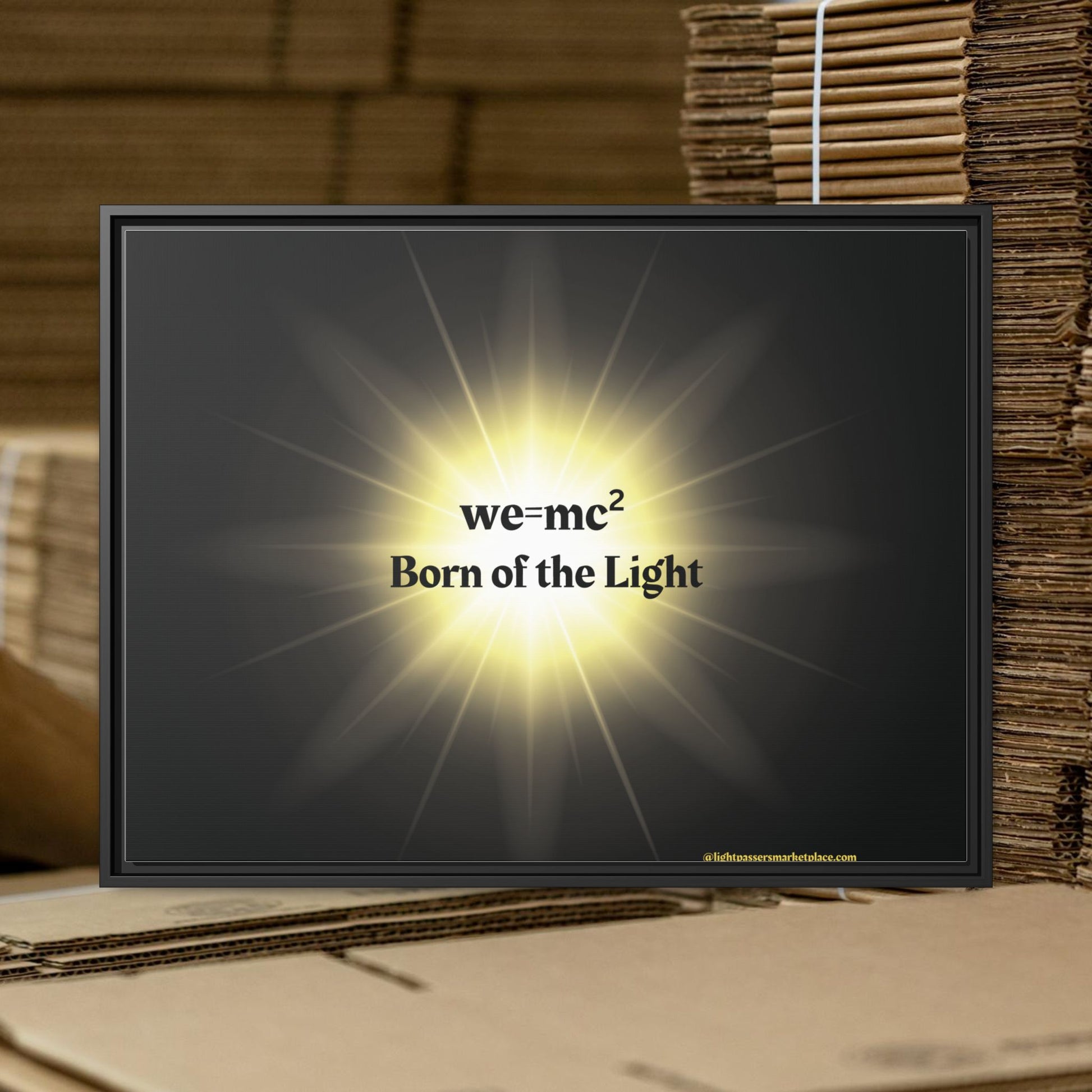 Inspirational Framed Canvas Art - we=mc² Born of the Light, featuring a black frame with a radiant yellow light, perfect for uplifting spaces.