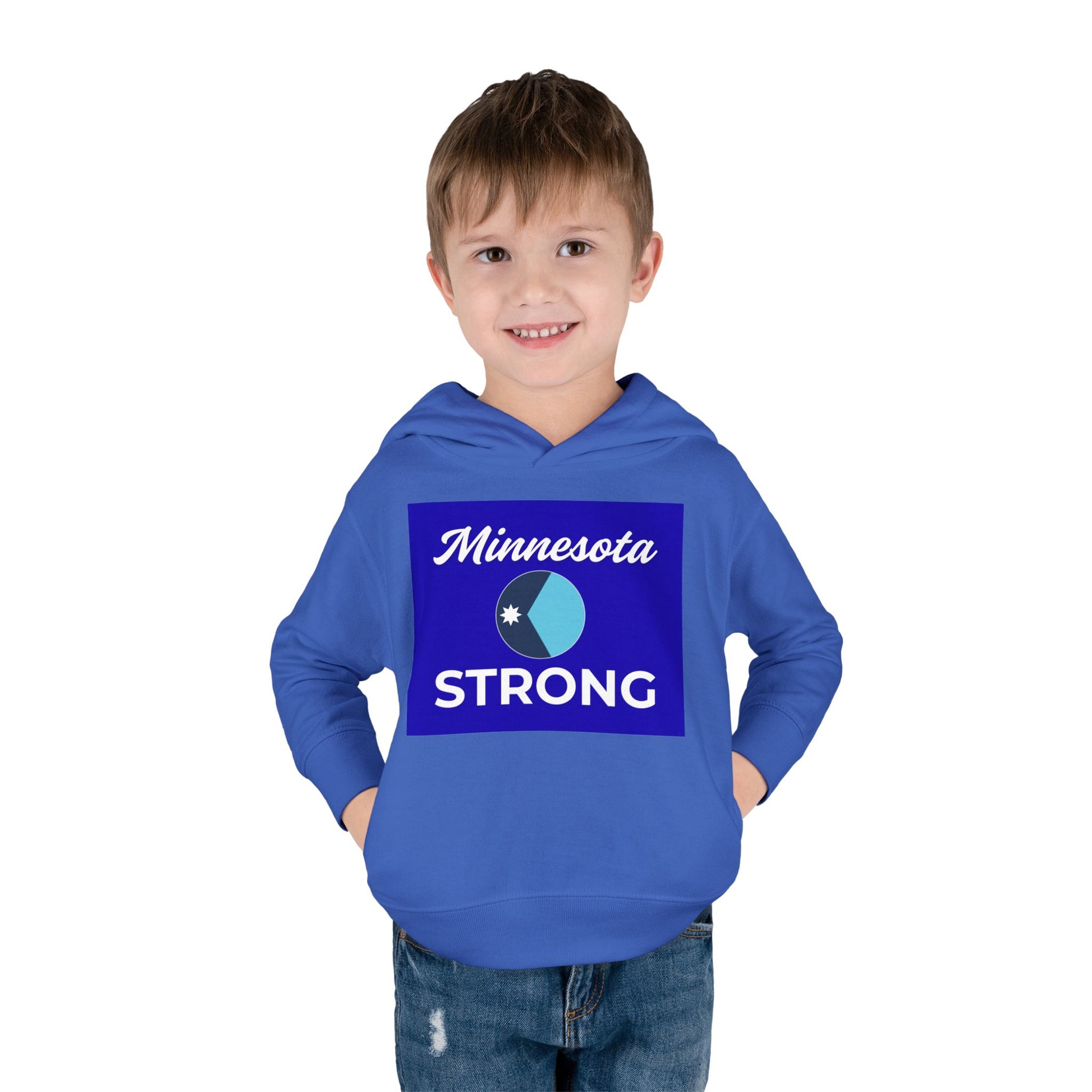 Young boy smiles wearing Minnesota Strong blue hoodie, showcasing state pride. Features cozy fleece, front pocket, and durable design. Perfect for toddler adventures.