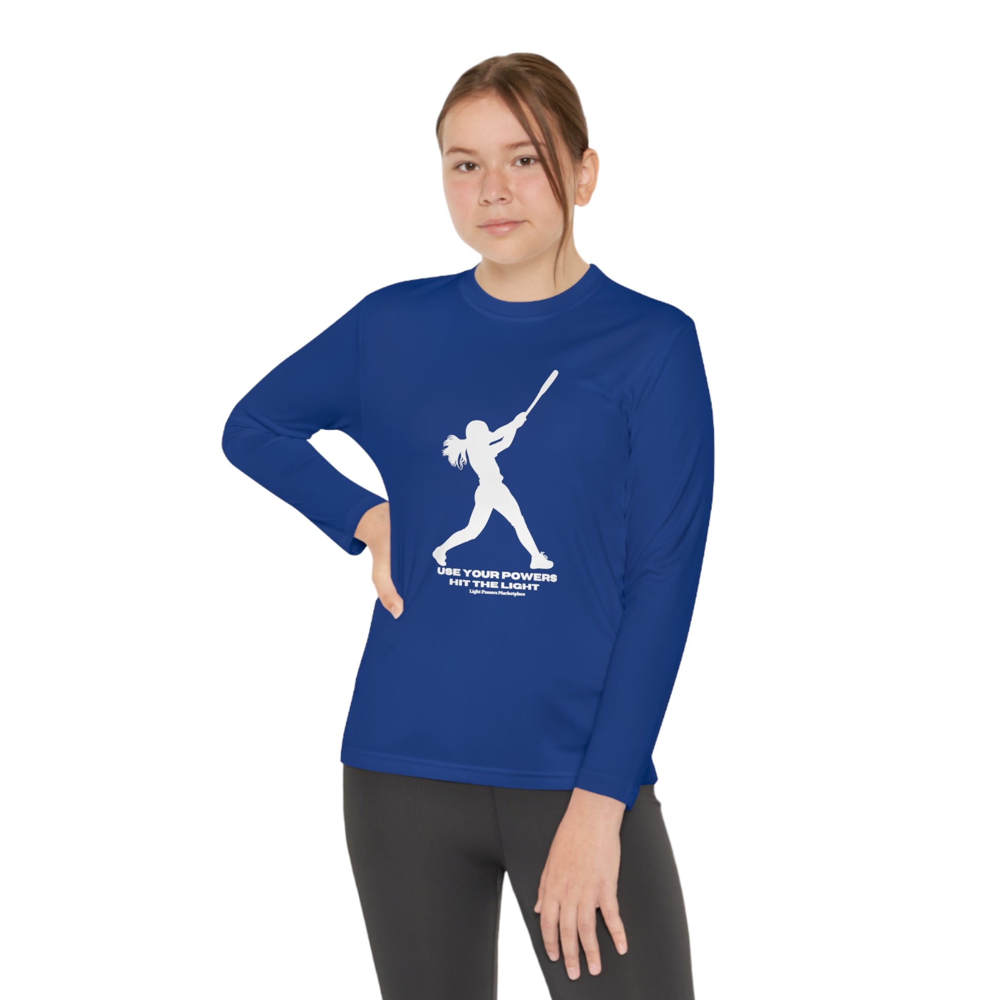 A girl in a blue long-sleeve tee swings a bat. Sport-Tek PosiCharge ® Competitor™ tee: 100% polyester, lightweight, moisture-wicking, tear-away label. Ideal for active kids.