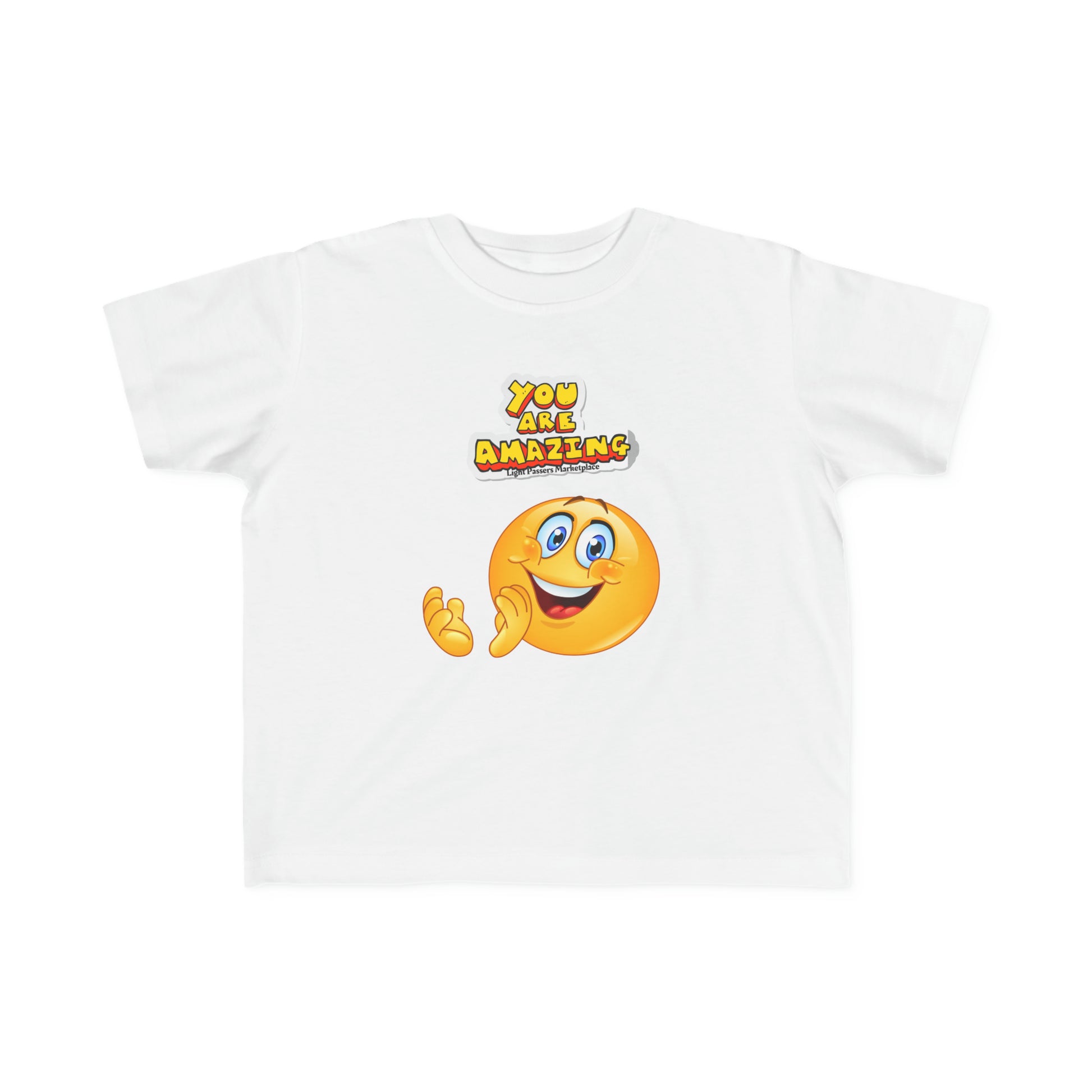 A white toddler t-shirt featuring a cartoon face and logo, made of soft 100% combed cotton. Durable print, light fabric, tear-away label, classic fit, true to size.
