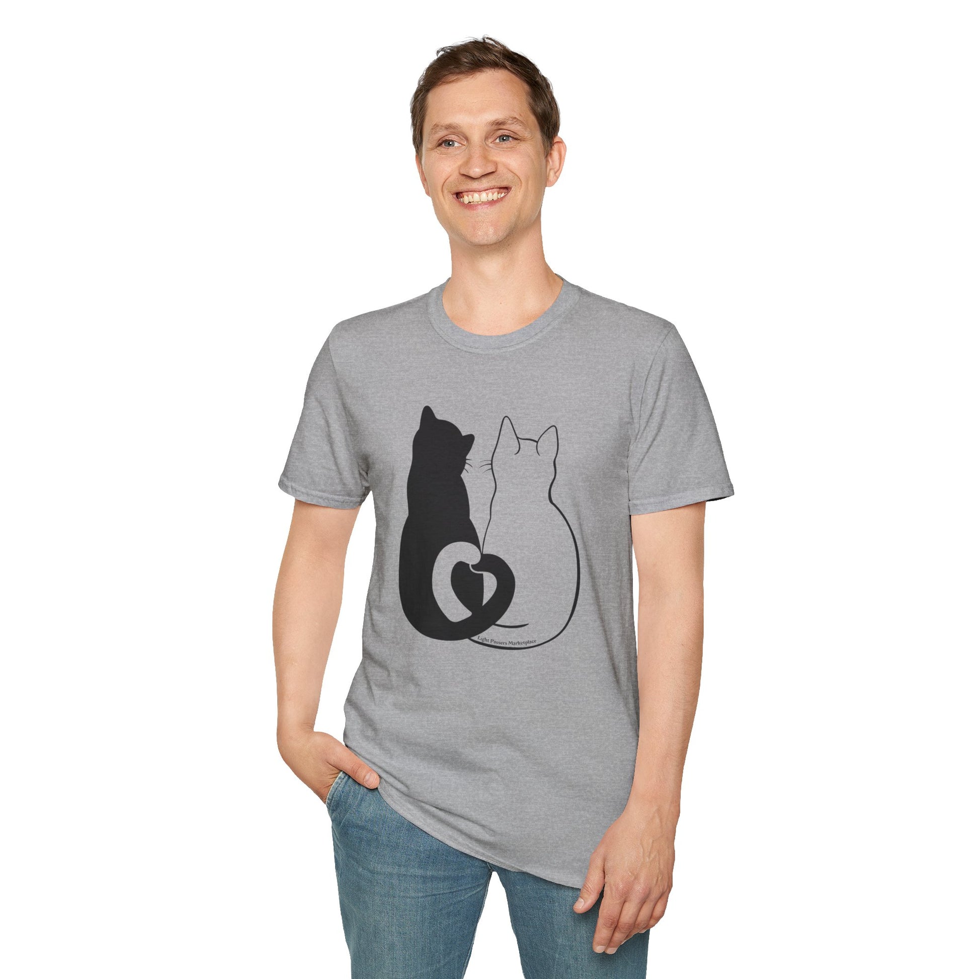 A man smiles in a Cats in Love unisex t-shirt, featuring playful cat designs. Made of soft 100% cotton, with twill tape shoulders for durability and a ribbed collar. Ethically produced by Gildan.