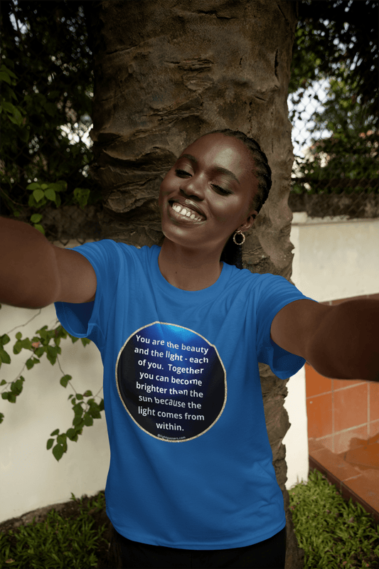 A woman in a navy circle unisex t-shirt takes a selfie, showcasing the classic fit and smooth fabric of the tee. No side seams for added comfort.