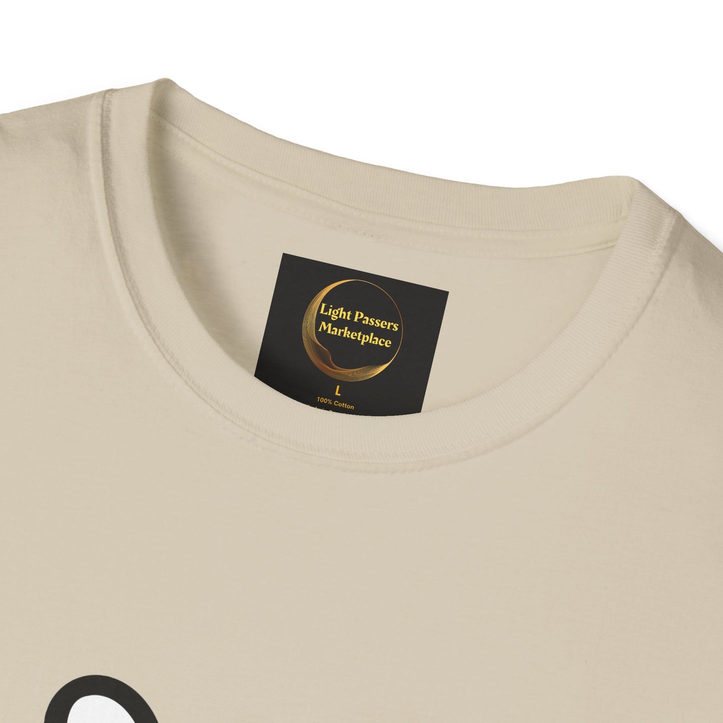 Close-up of the Soccer Dog Unisex T-Shirt's collar, featuring a black tag with a gold logo, displaying size L and 100% Cotton.