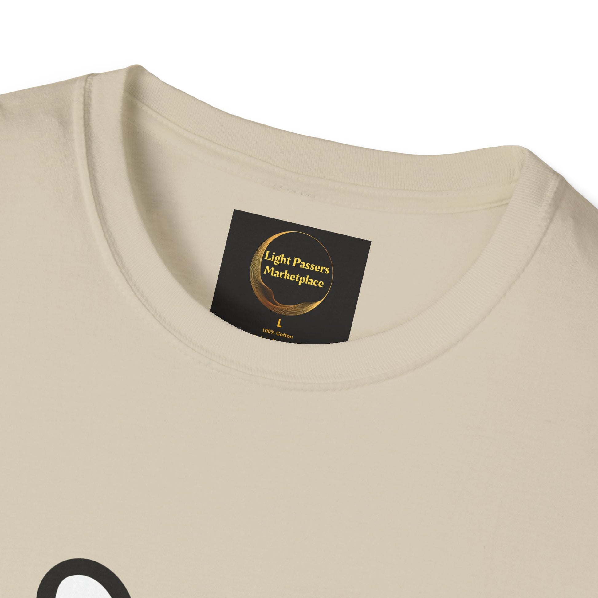 Close-up of the Soccer Dog Unisex T-Shirt's collar, featuring a black tag with a gold logo, displaying size L and 100% Cotton.