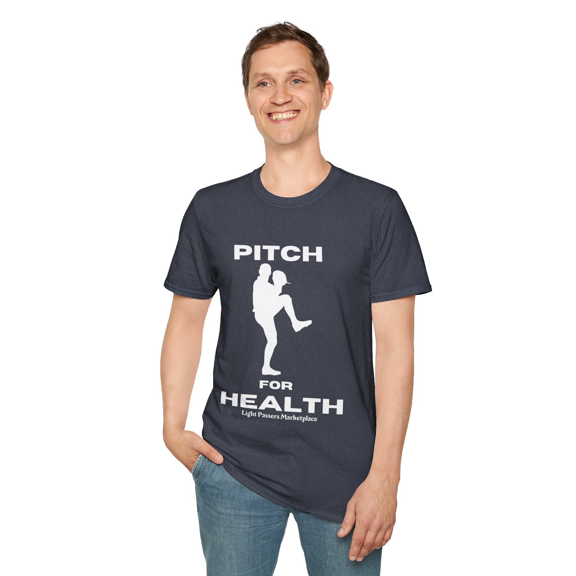 A smiling man in a Pitch for Health Unisex T-Shirt, showcasing a casual, comfortable style. Made of soft 100% cotton with twill tape shoulders for durability and a ribbed collar.