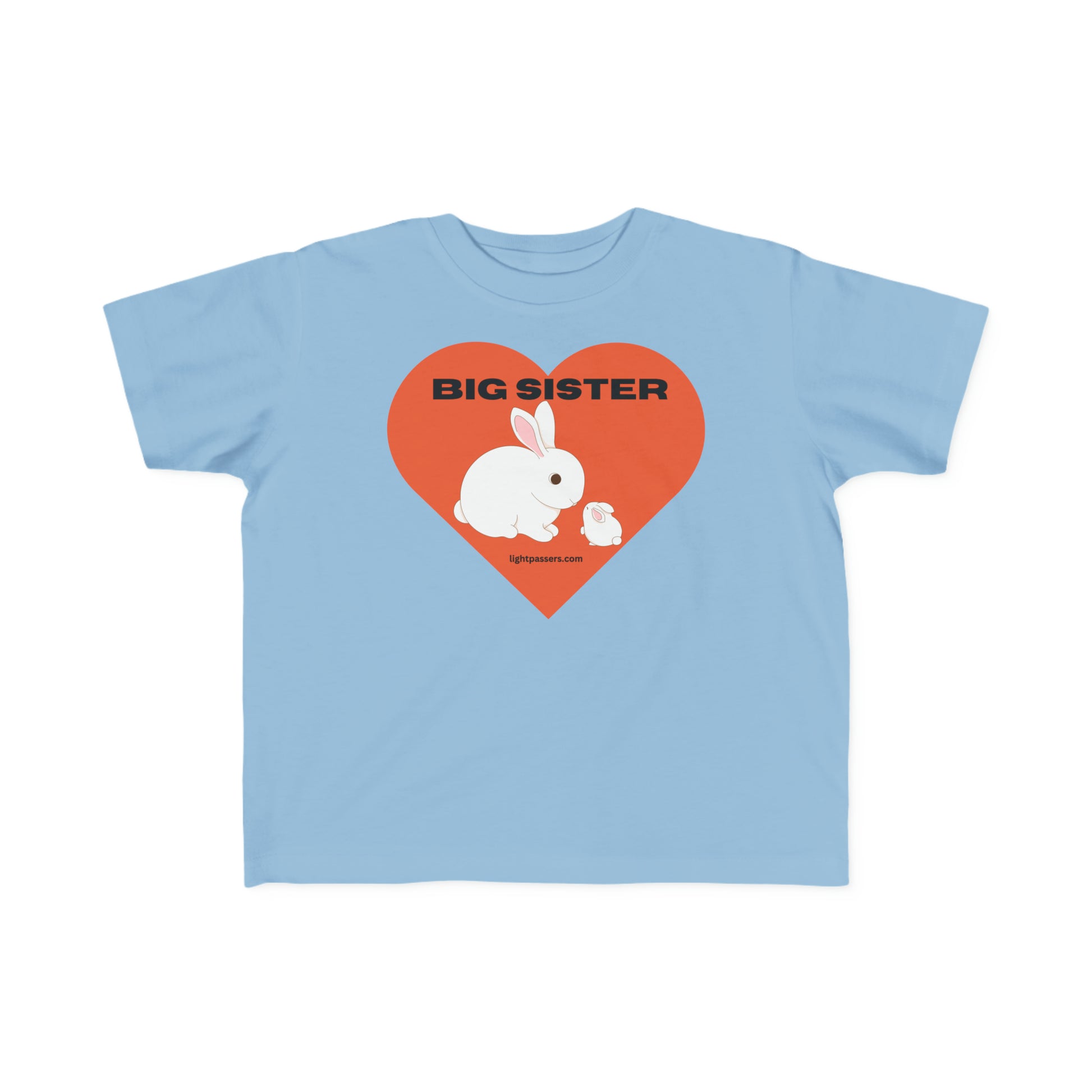 A toddler's Big Sister T-shirt featuring a white rabbit and red heart design on a blue tee. Soft, 100% combed cotton, durable print, tear-away label, classic fit.