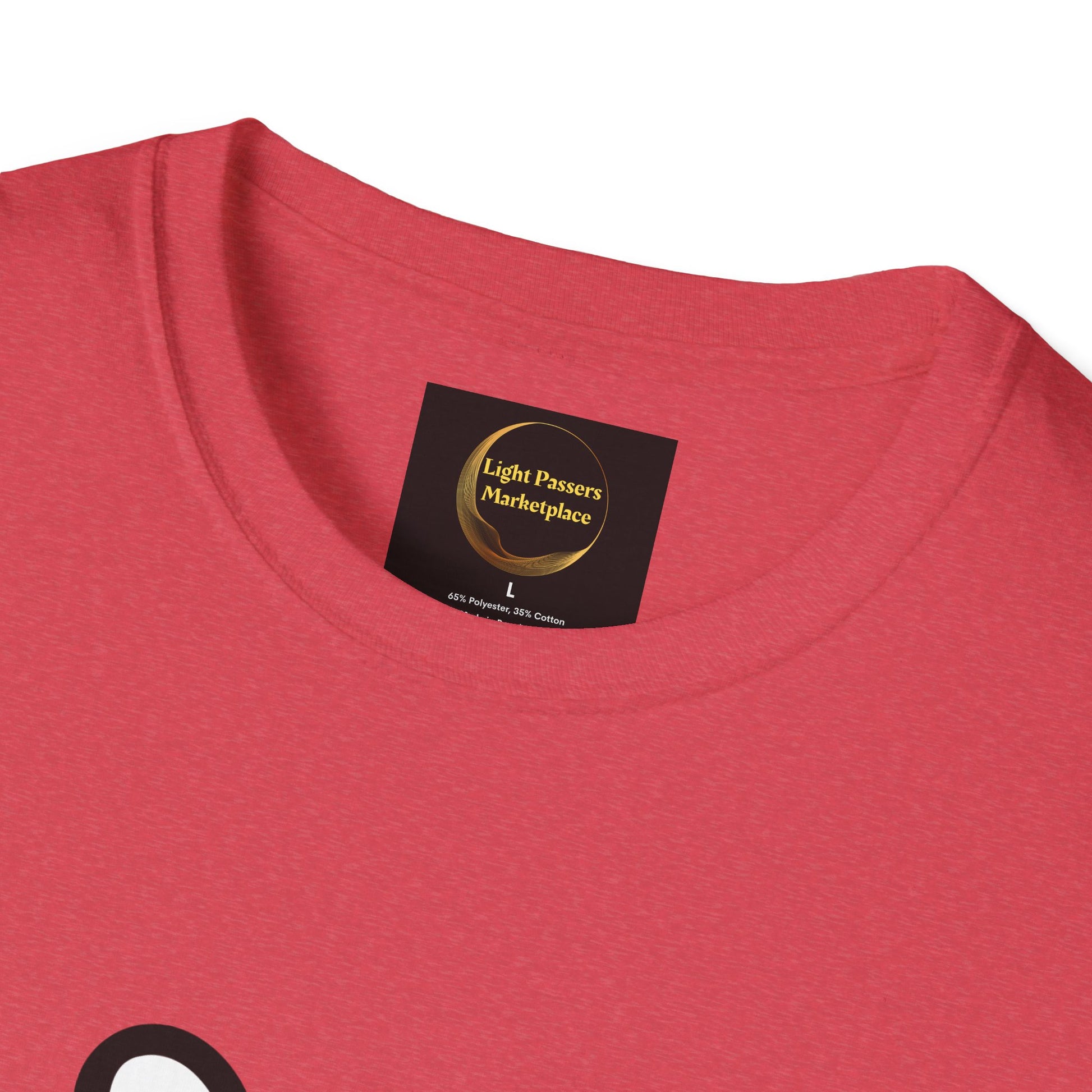 Close-up of a red heathered Soccer Dog Unisex T-Shirt neckline with a black Light Passers Marketplace label, highlighting soft, durable fabric and ethical craftsmanship.