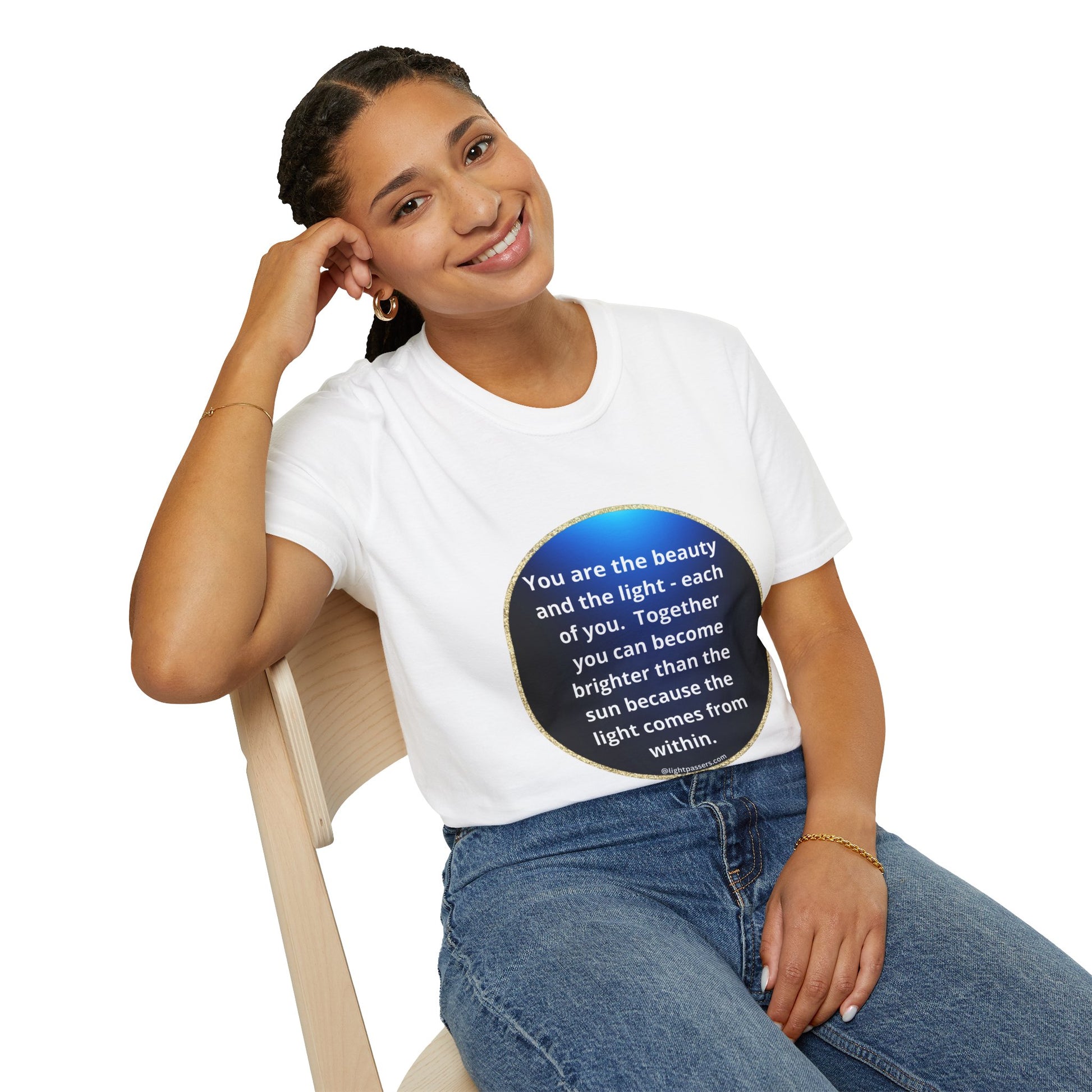 Woman in Beauty Navy Circle Unisex T-shirt, smiling on chair. Close-up of shirt's smooth surface for vivid printing. No side seams for comfort.