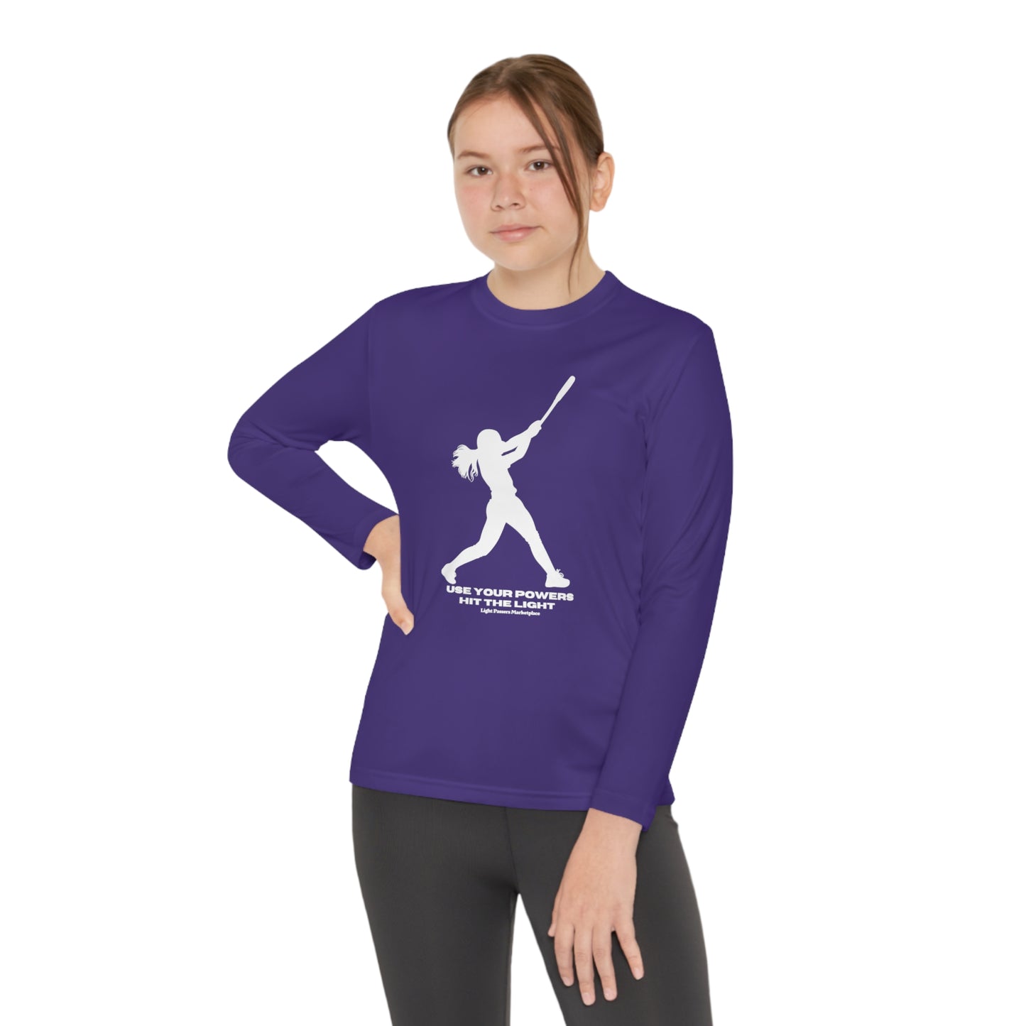 A girl in a purple Sport-Tek PosiCharge ® Competitor™ tee, swinging a bat, showcasing the moisture-wicking polyester fabric, perfect for active kids.
