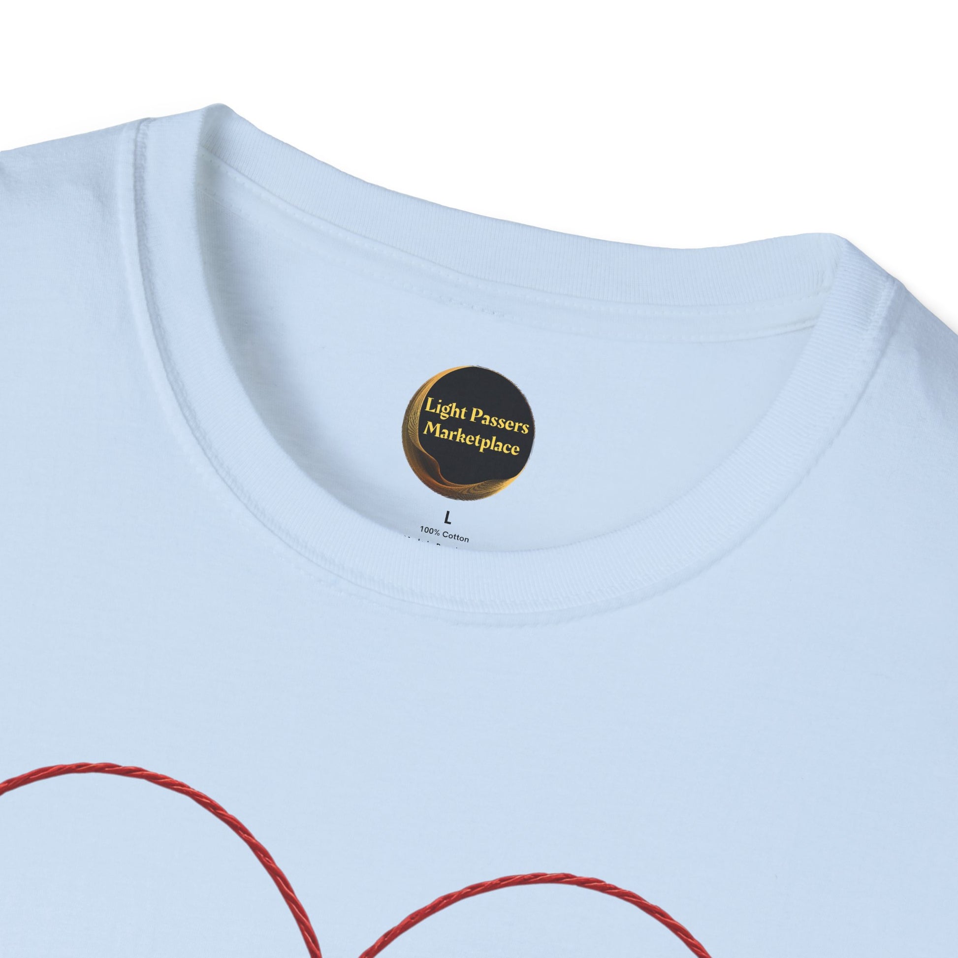 Close-up of the Legacy Makers Unite T-Shirt’s neckline featuring a black label with gold text, and a glimpse of a red rope graphic.
