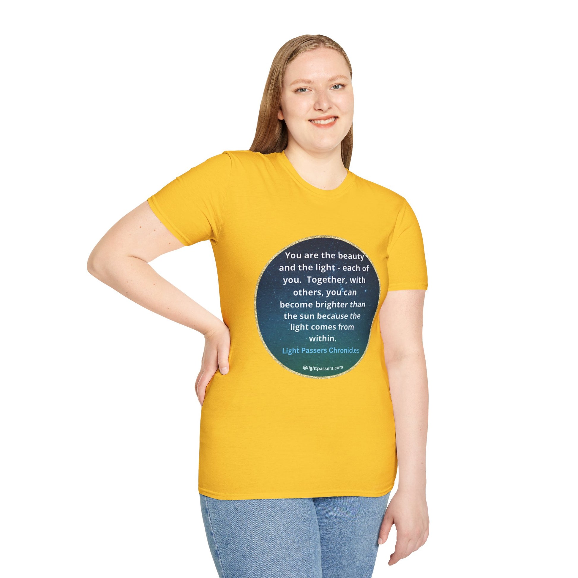 A woman in a yellow shirt smiling, showcasing the Beauty and the Light Unisex T-shirt. Close-up of blue jeans, emphasizing casual fashion. Alt text combines image data and product description for accessibility.