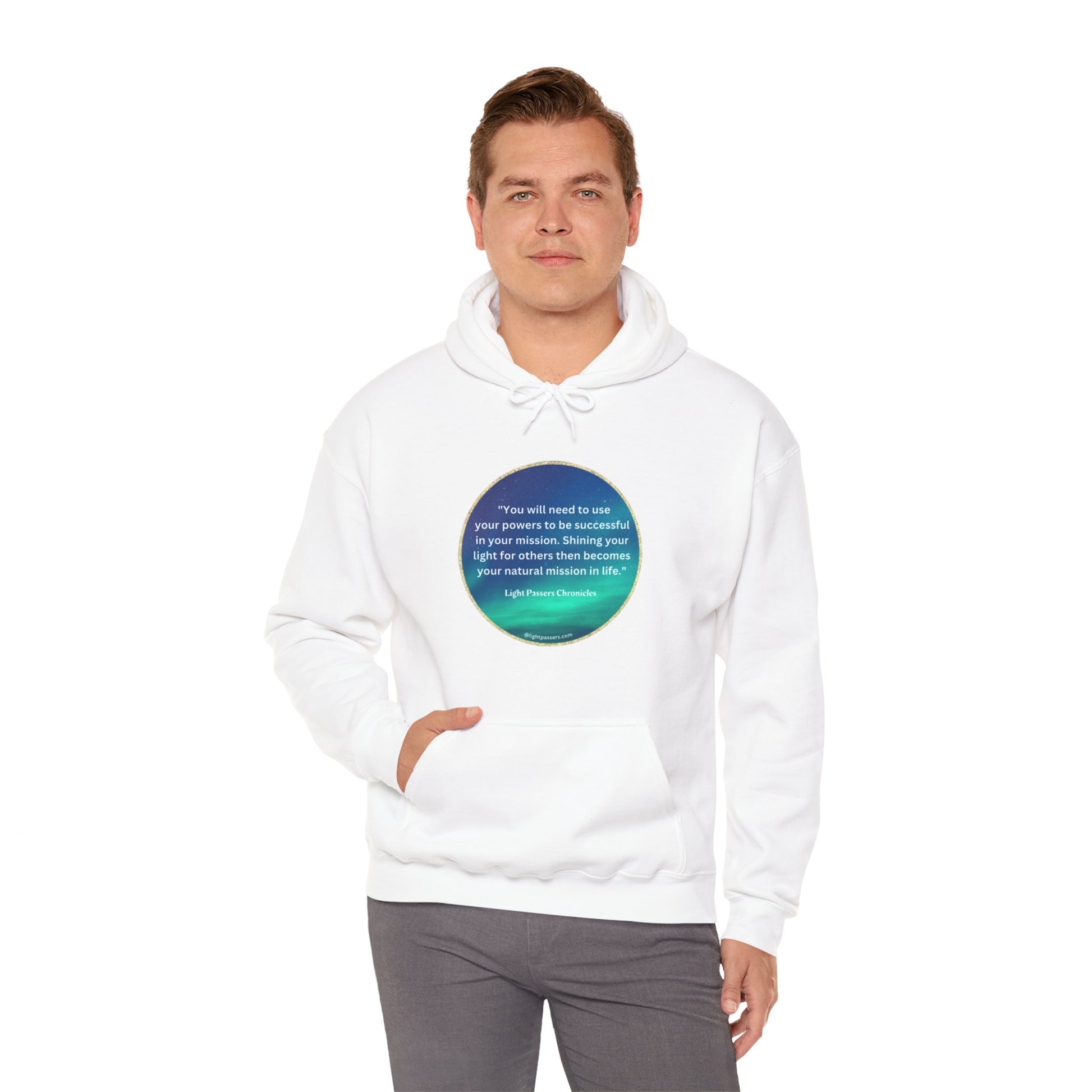 A man in a white sweatshirt with a blue circle and text, showcasing the Use Your Powers turquoise circle Unisex Hooded Sweatshirt. Made of 50% cotton and 50% polyester, featuring a kangaroo pocket and color-matched drawstring.