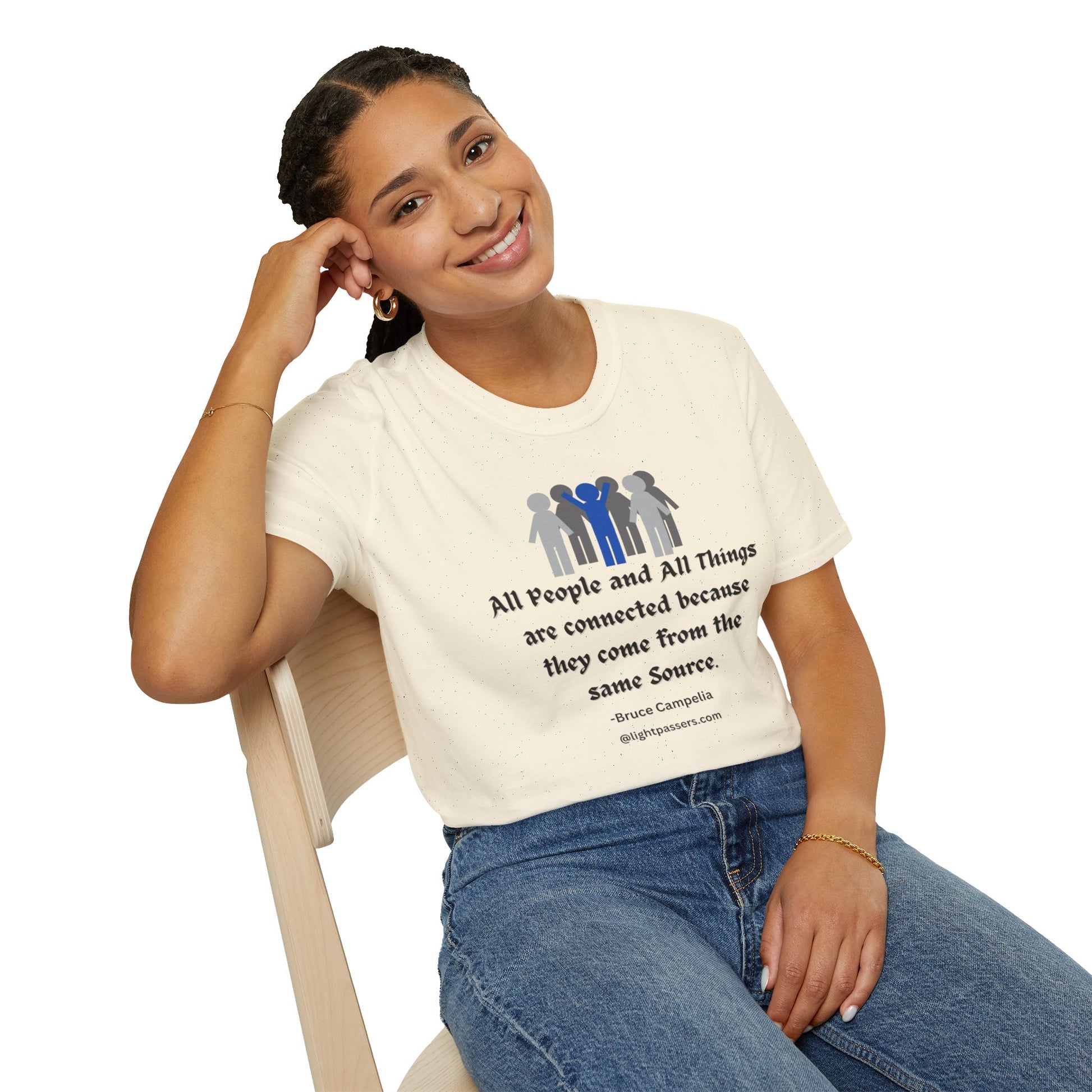 A woman in a white shirt and blue jeans sits on a chair, smiling. Close-ups of her hand, t-shirt, and face. Unisex heavy cotton tee with smooth surface for premium printing.