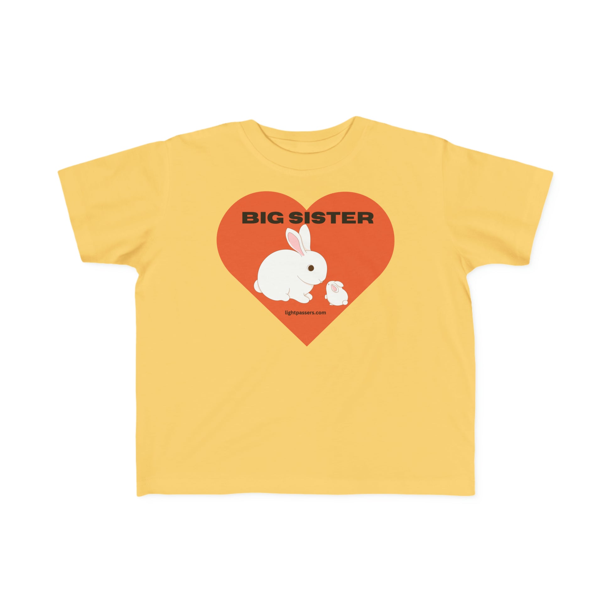 A yellow toddler t-shirt featuring a white rabbit and heart design, made of soft 100% combed cotton for sensitive skin. Durable print, tear-away label, classic fit, and lightweight fabric.