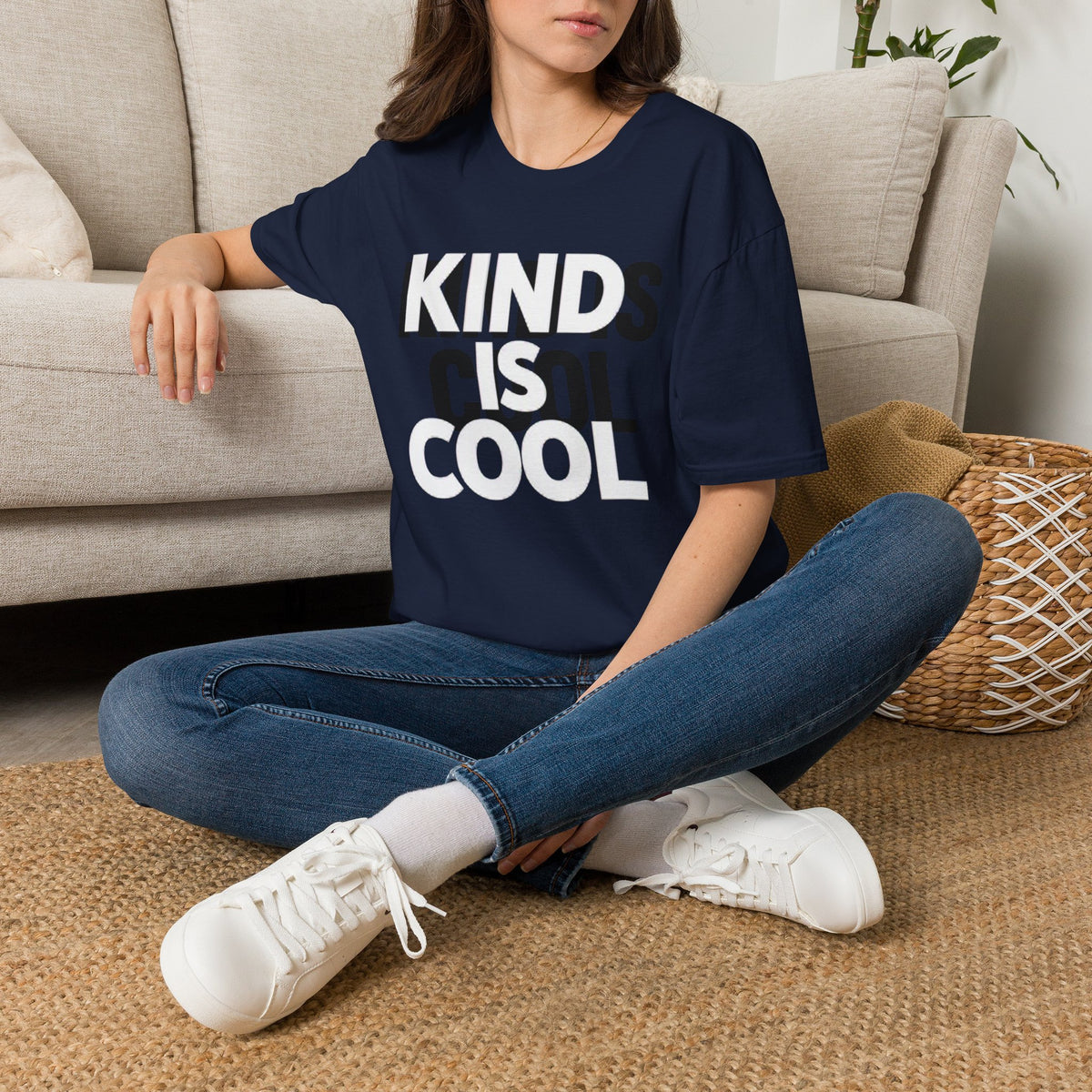 Navy unisex T-shirt with large text graphic reading “KIND IS COOL”