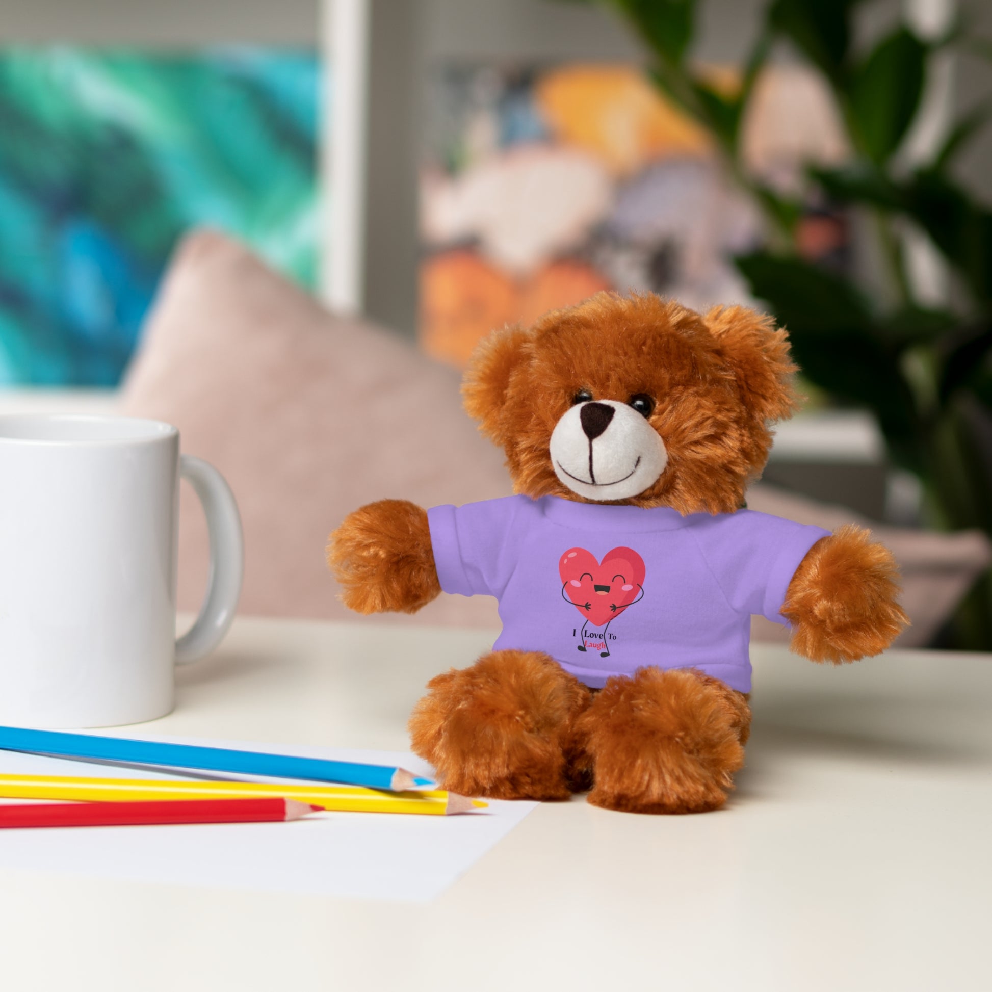 Teddy bear wearing a removable purple I Love to Laugh shirt, part of Cool Stuff Stuffies collection, perfect for gifting and cuddling.