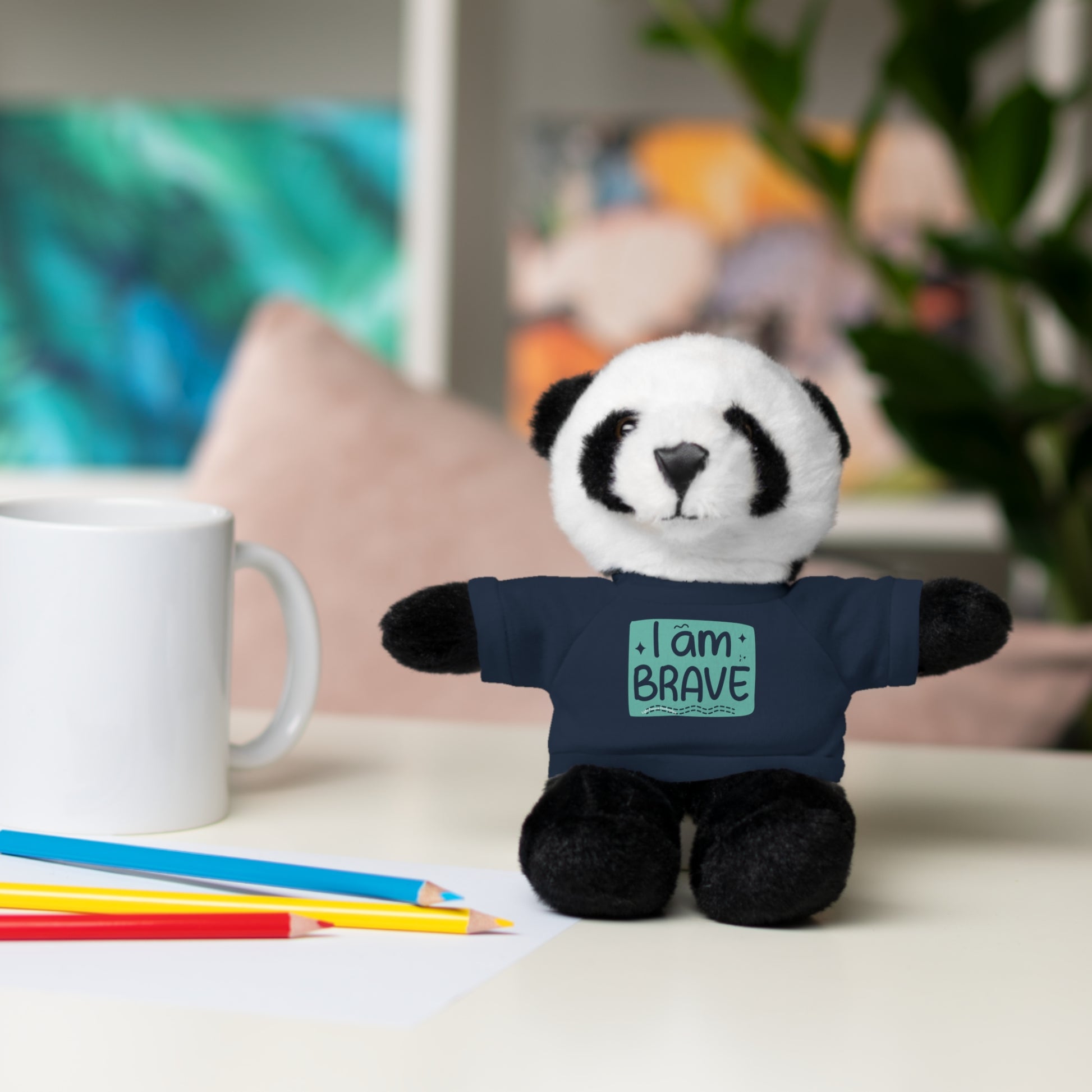 Stuffed panda bear with I am Brave shirt from Cool Stuff Stuffies collection, featuring customizable tees, perfect for cuddling and decor.