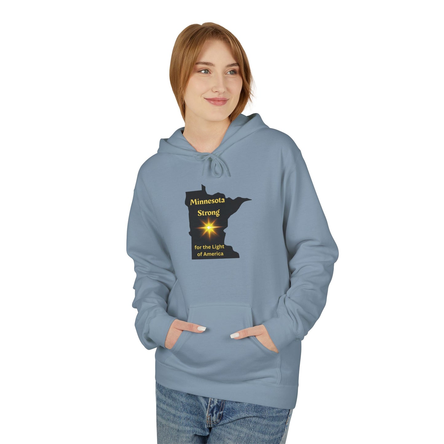 Young woman in a Love and Peace The Light Adult Unisex Minnesota State Hoodie, featuring Minnesota Strong and a starburst, embodies community warmth and pride.