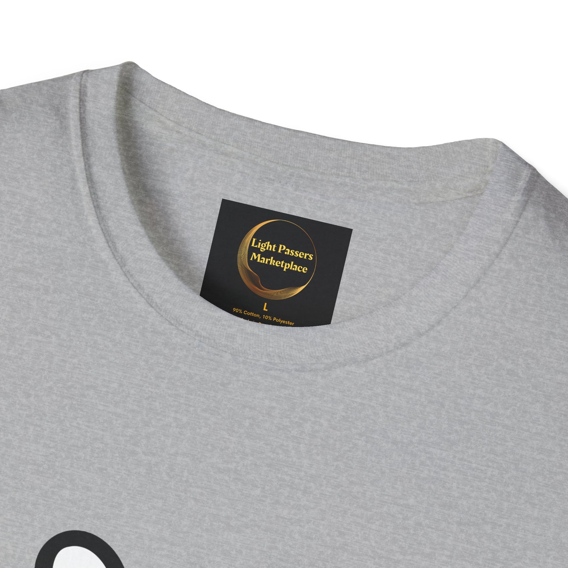 Light-heather-gray Soccer Dog Unisex T-Shirt with a black woven label featuring gold swirl, Light Passers Marketplace, size L, made of 90% cotton/10% polyester.