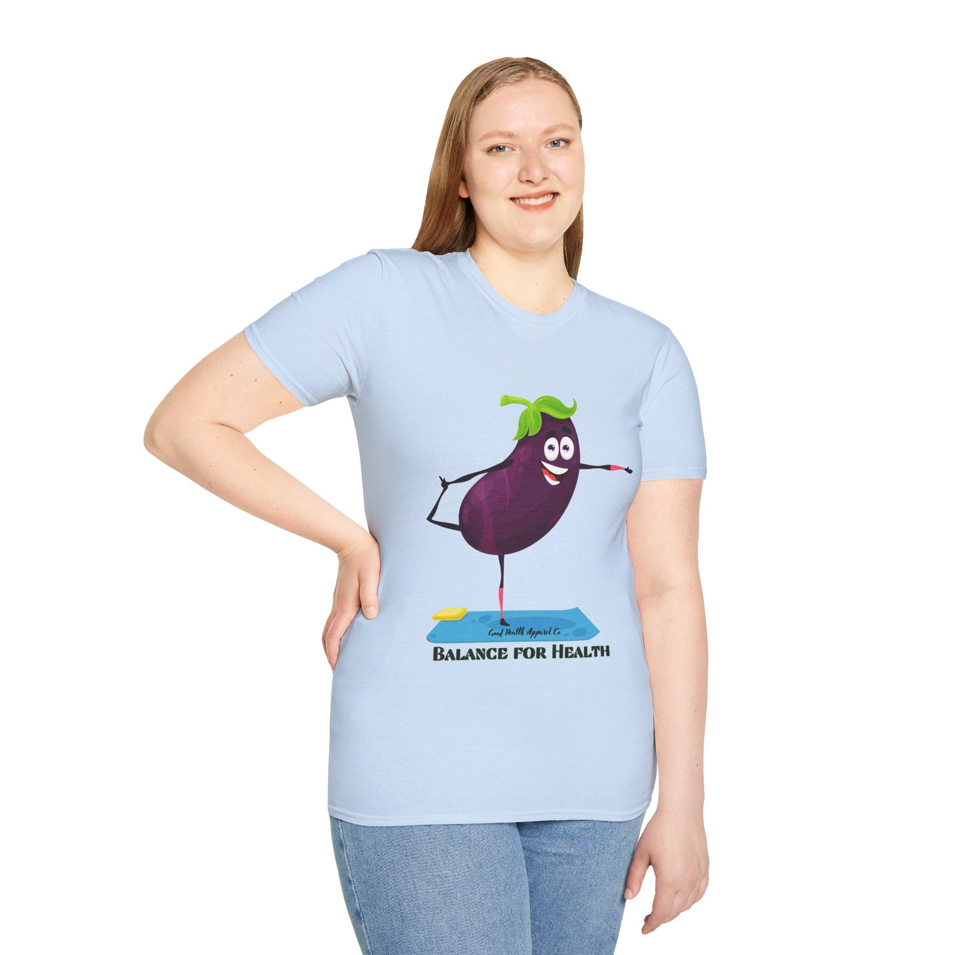 A woman smiles, wearing a unisex t-shirt with a cartoon eggplant design. The tee, made of soft 100% cotton, features twill tape shoulders and ribbed collar for durability and comfort.