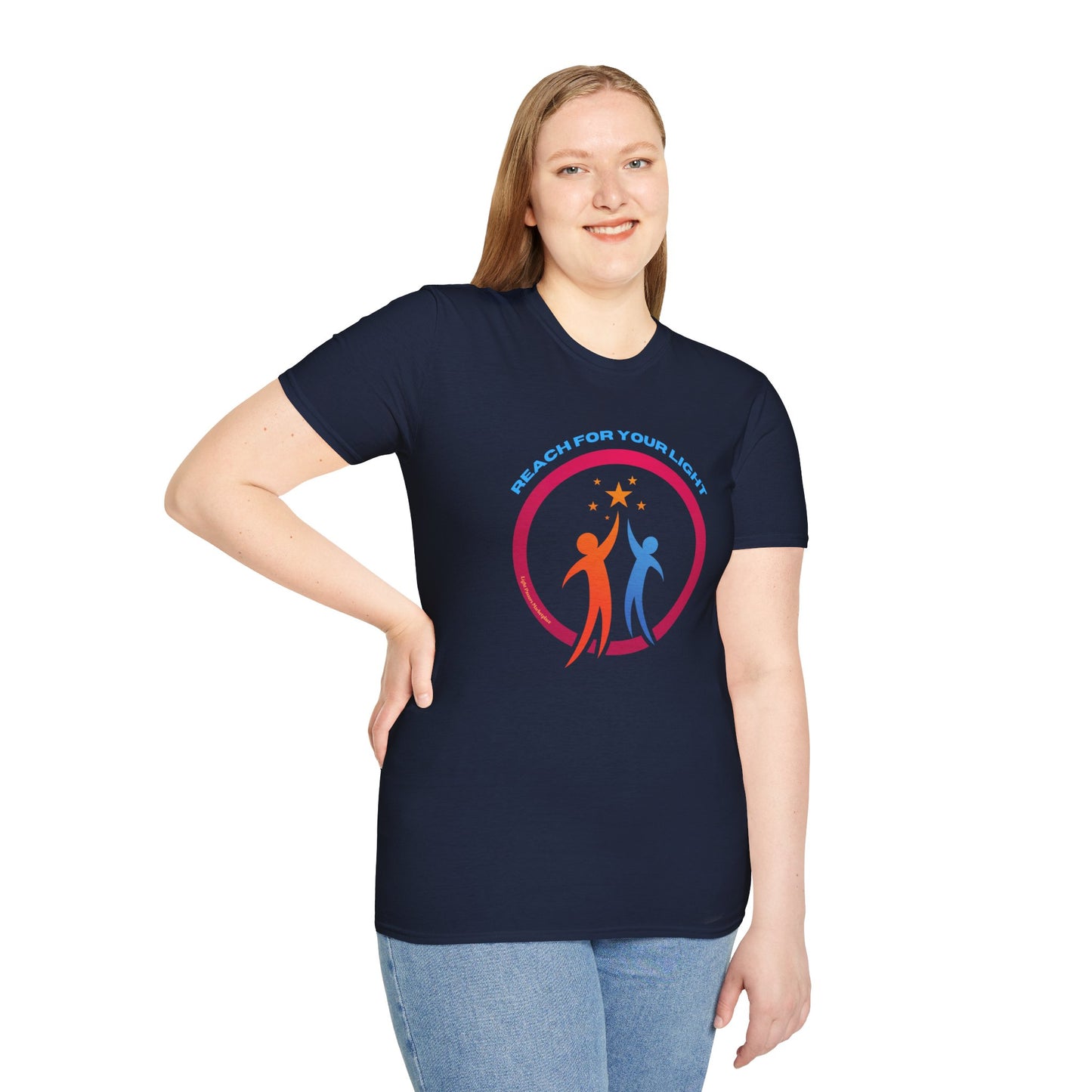 A woman in a blue Reach for Your Light unisex t-shirt, showcasing a casual fit with ribbed collar and twill tape shoulders for durability. Made from soft 100% cotton with no side seams.