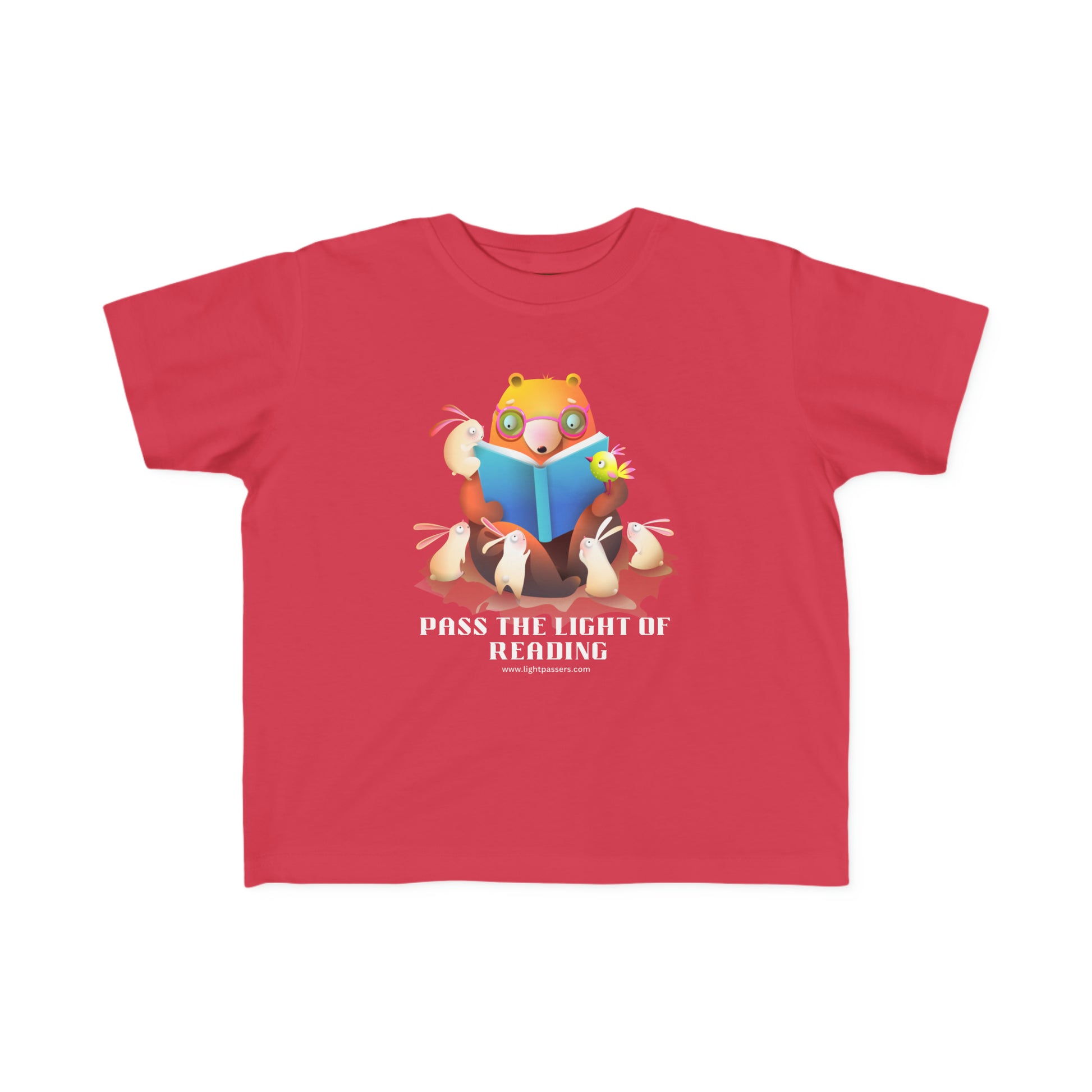 A red toddler t-shirt featuring a cartoon bear engrossed in reading, ideal for sensitive skin. Made of 100% combed cotton, light fabric, durable print, tear-away label, and a classic fit.