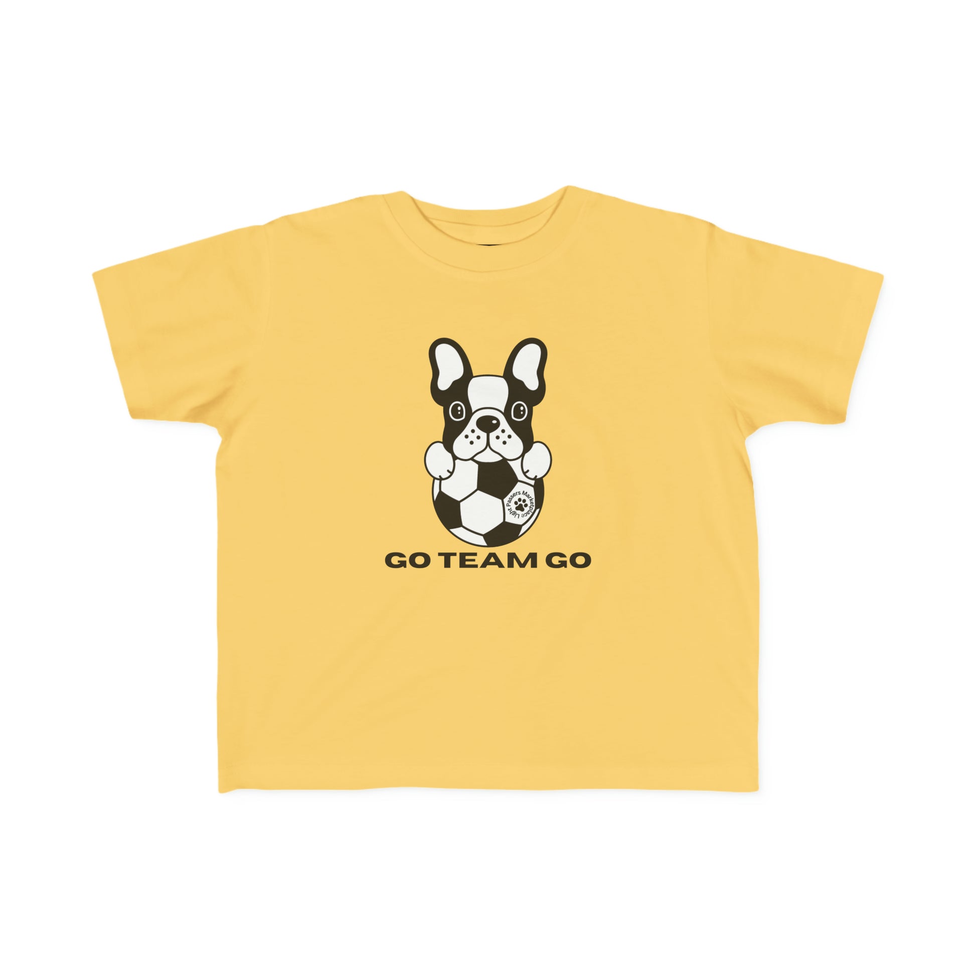 A yellow toddler t-shirt featuring a dog playing soccer, ideal for sensitive skin. Made of 100% combed, ring-spun cotton with a durable print. Classic fit, tear-away label, and lightweight fabric.