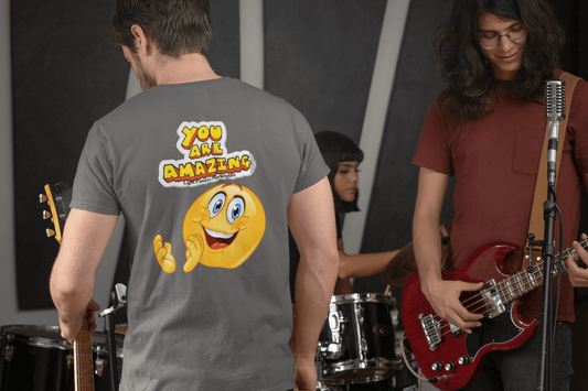 A group of musicians playing instruments, a person in a grey smiley face shirt, a man playing guitar and holding a microphone, and a close-up of a guitar neck. This unisex soft-style t-shirt in 100% ring-spun cotton offers versatile style and comfort.