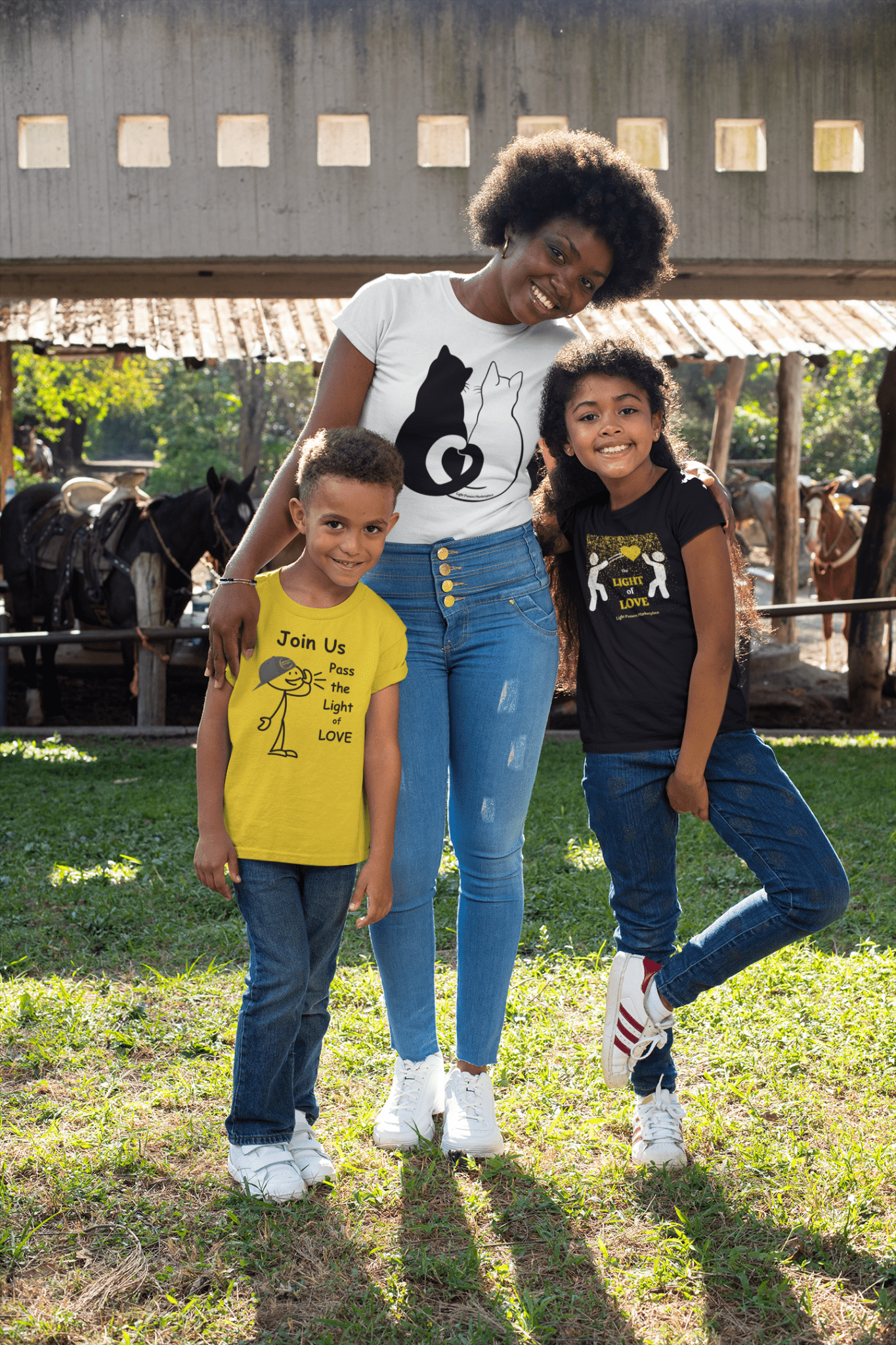 Youth T-shirt featuring a woman, children, and a horse outdoors. 100% cotton, twill tape shoulders, ribbed collar, no side seams. Ideal for printing. Classic fit, tear-away label, midweight fabric.