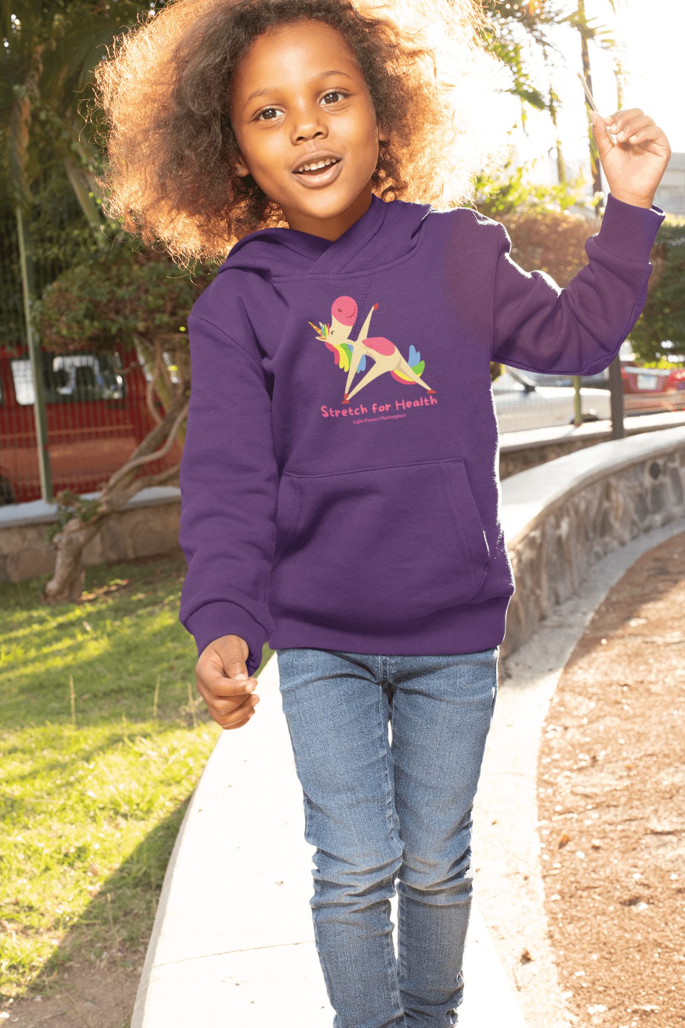 A toddler hoodie with a unicorn design, featuring a jersey-lined hood, cover-stitched details, and side-seam pockets for durability and comfort.