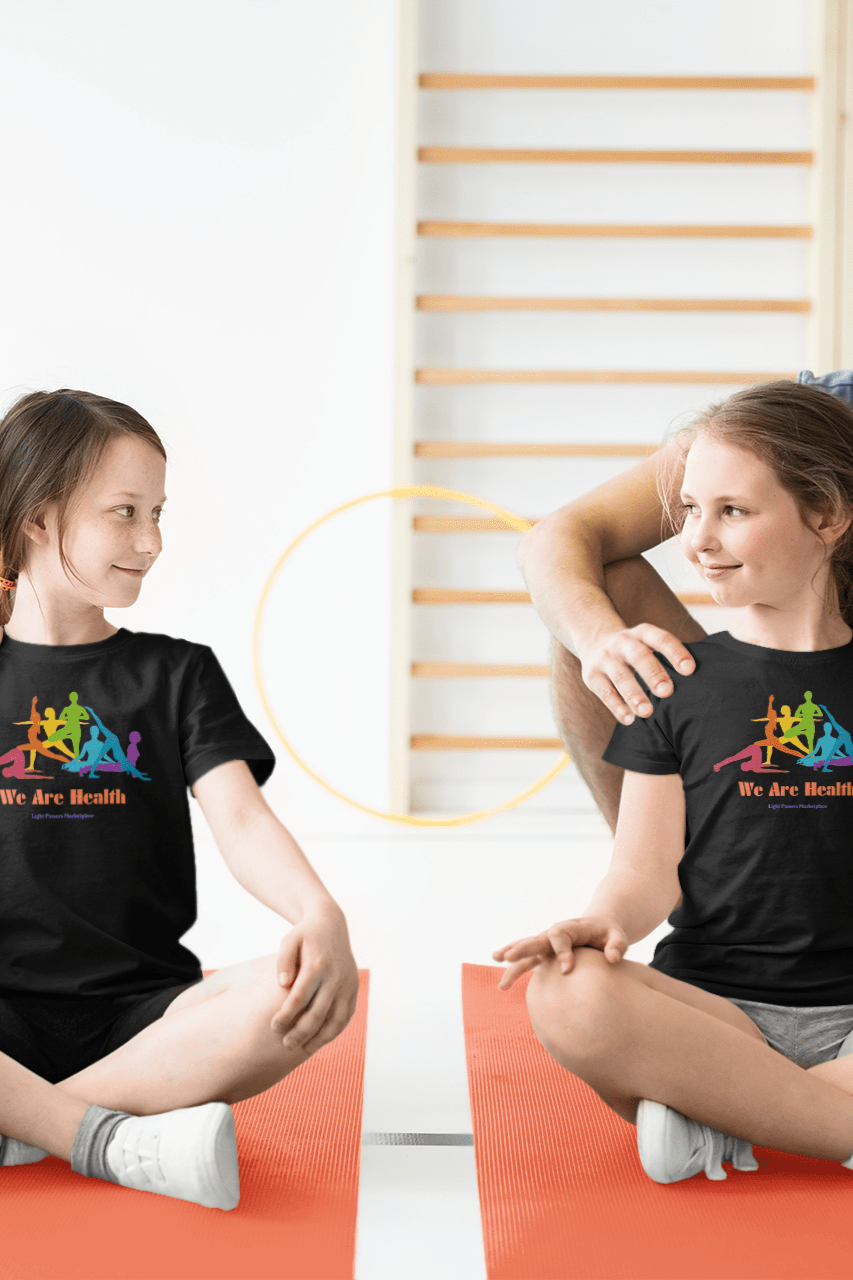 A group of people, including a girl and a man, sitting on yoga mats. Youth T-shirt for everyday wear, made of 100% cotton with twill tape shoulders and ribbed collar. Ethically sourced and durable.