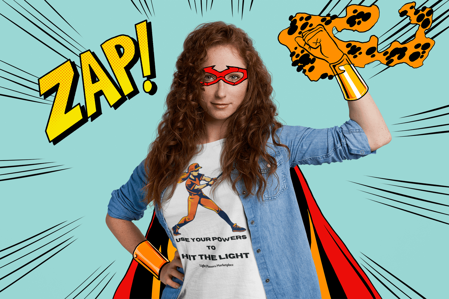 A girl in a superhero garment, holding up a fist, wearing a mask, and posing for a picture on a youth t-shirt. Made with 100% cotton, ribbed collar, tear-away labels, and ethically sourced materials.