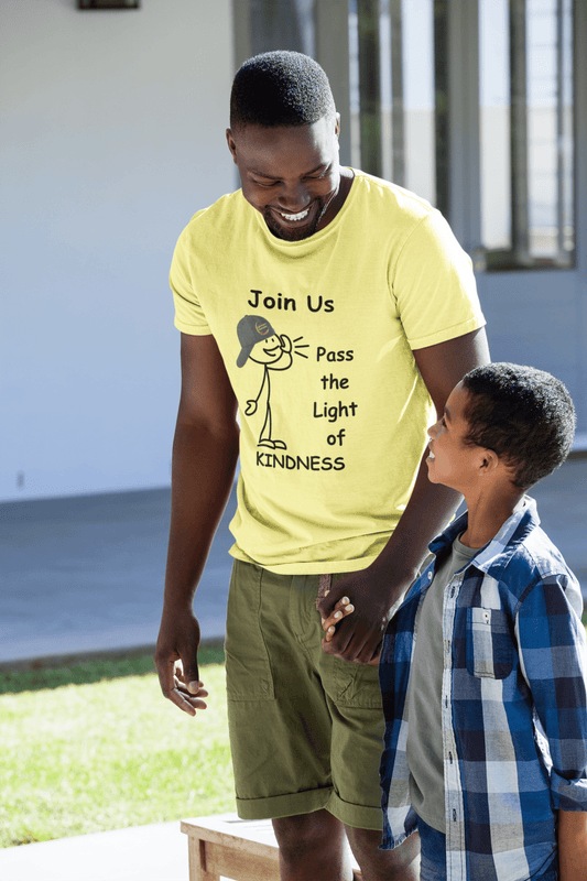 A man and a boy hold hands, showcasing the Join Us Pass the Light of Kindness Unisex T-Shirt. Made of soft 100% cotton, featuring twill tape shoulders for durability and a clean crew neckline.